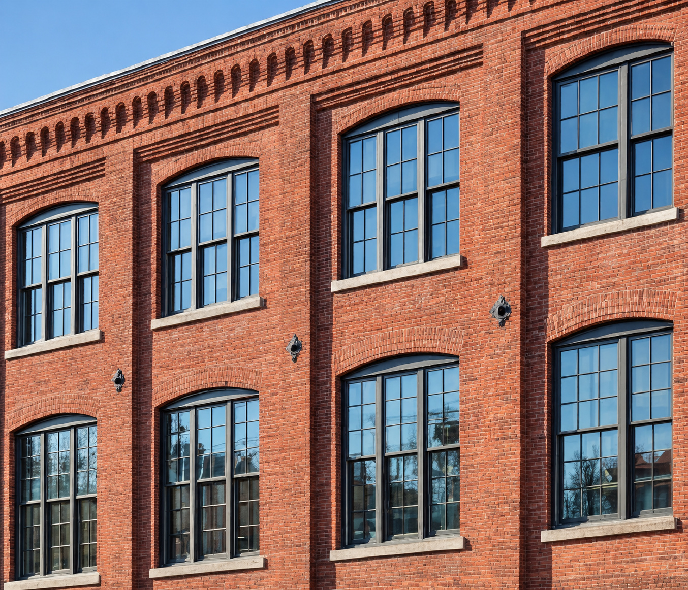 Divided-lite windows and heritage-inspired façades