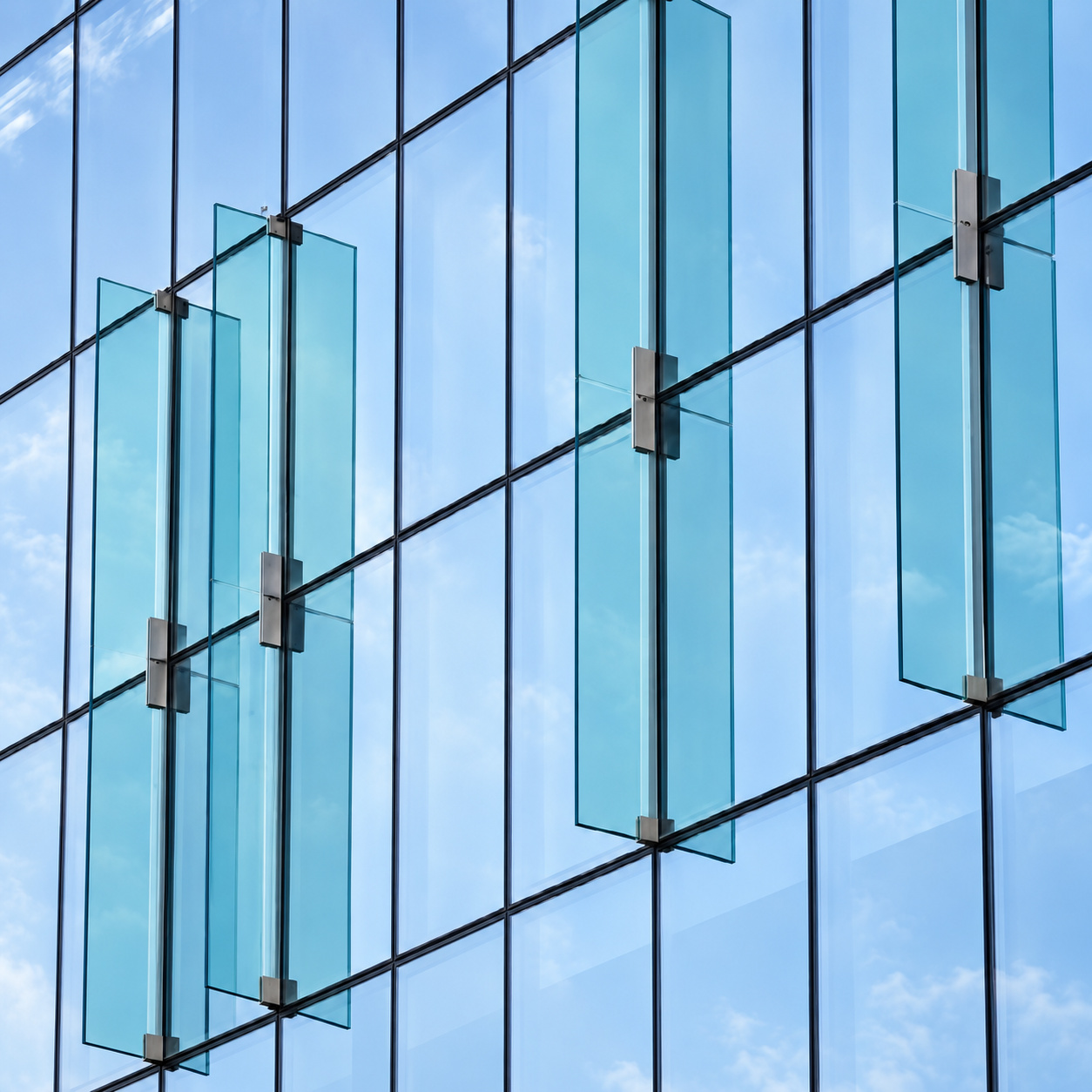 Vertical fins and overhead glazing
